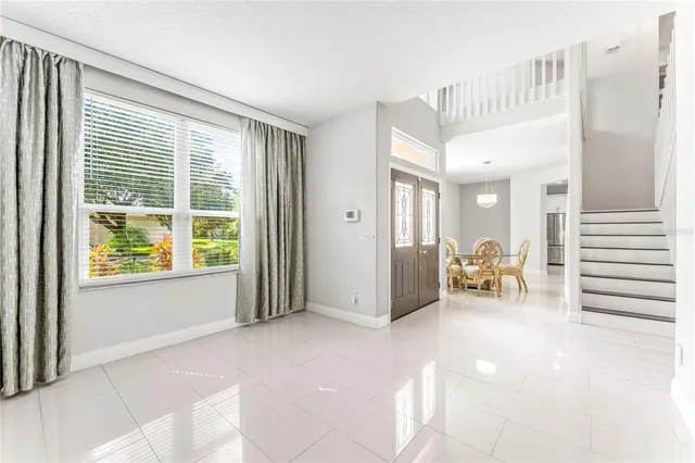 a view of a livingroom with a lounge chair