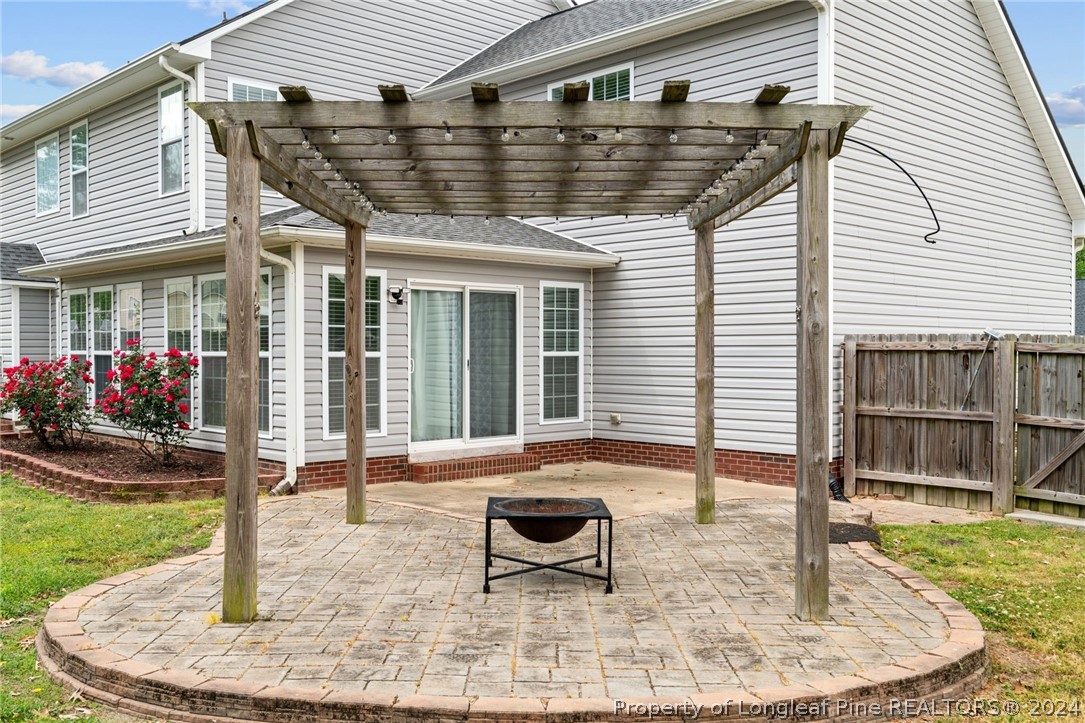 39 Fair Barn Road Sanford, NC 27332 - Photo 40 of 48 a backyard of a house with outdoor seating