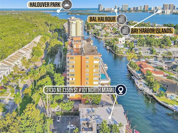 a view of a house with a yard and plants