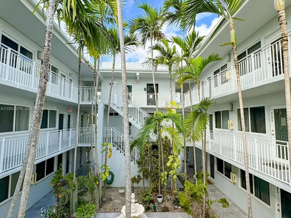 a view of a lake with sitting area