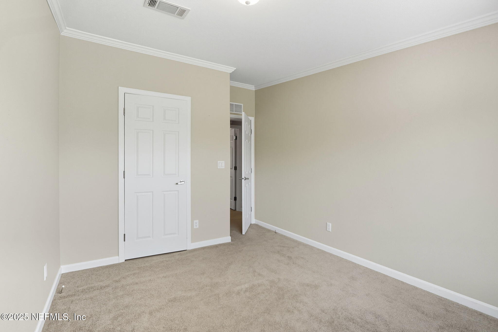 2054 Louie Carter Road Jacksonville, FL 32234 - Photo 13 of 32 a view of an empty room