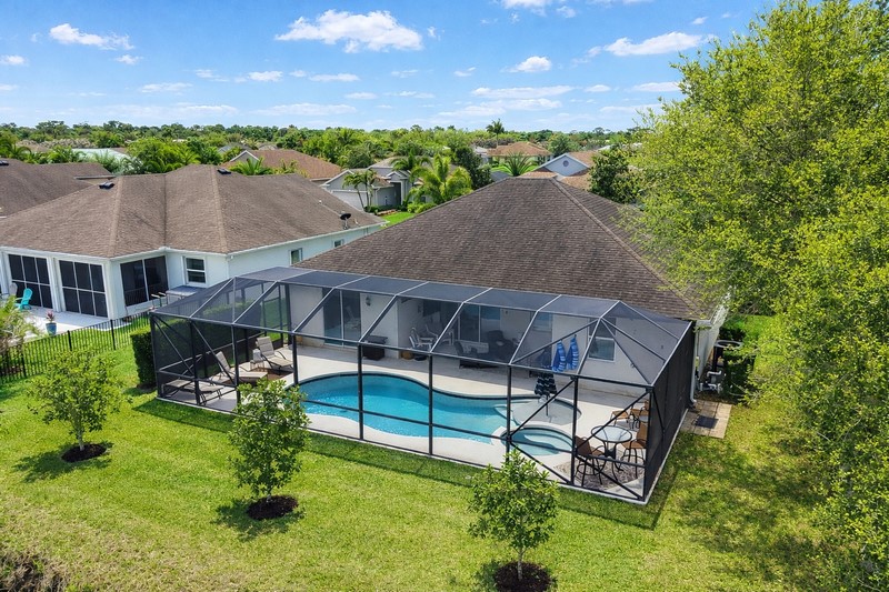 570 Gossamer Wing Way Sebastian, FL 32958 - Photo 35 of 36 an aerial view of a house with backyard garden and outdoor seating