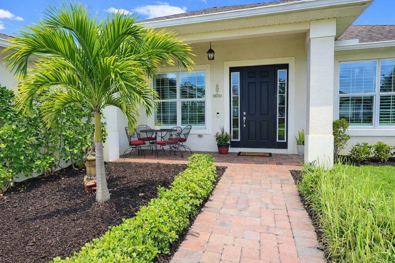 570 Gossamer Wing Way Sebastian, FL 32958 - Photo 4 of 36 a front view of a house with a yard