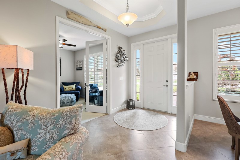 570 Gossamer Wing Way Sebastian, FL 32958 - Photo 6 of 36 a living room with furniture and a fireplace
