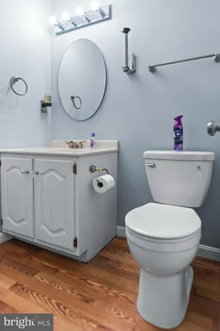a bathroom with a toilet and a sink