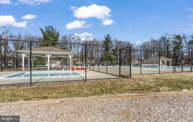 a view of a yard in front of a house
