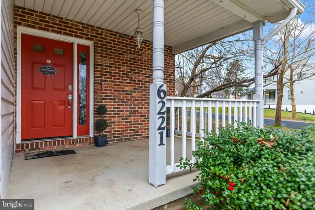 a view of a house with a small garden