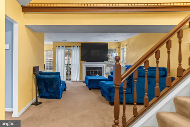 a living room with stairs