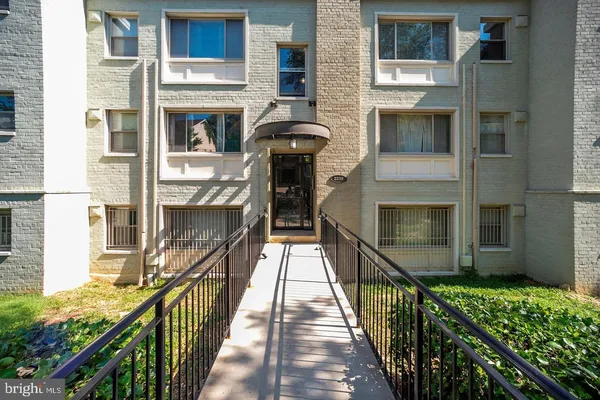 a view of a balcony with a potted plant
