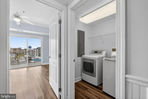 a view of a hallway with washer and dryer
