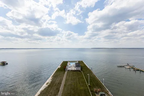 a view of swimming pool from a balcony