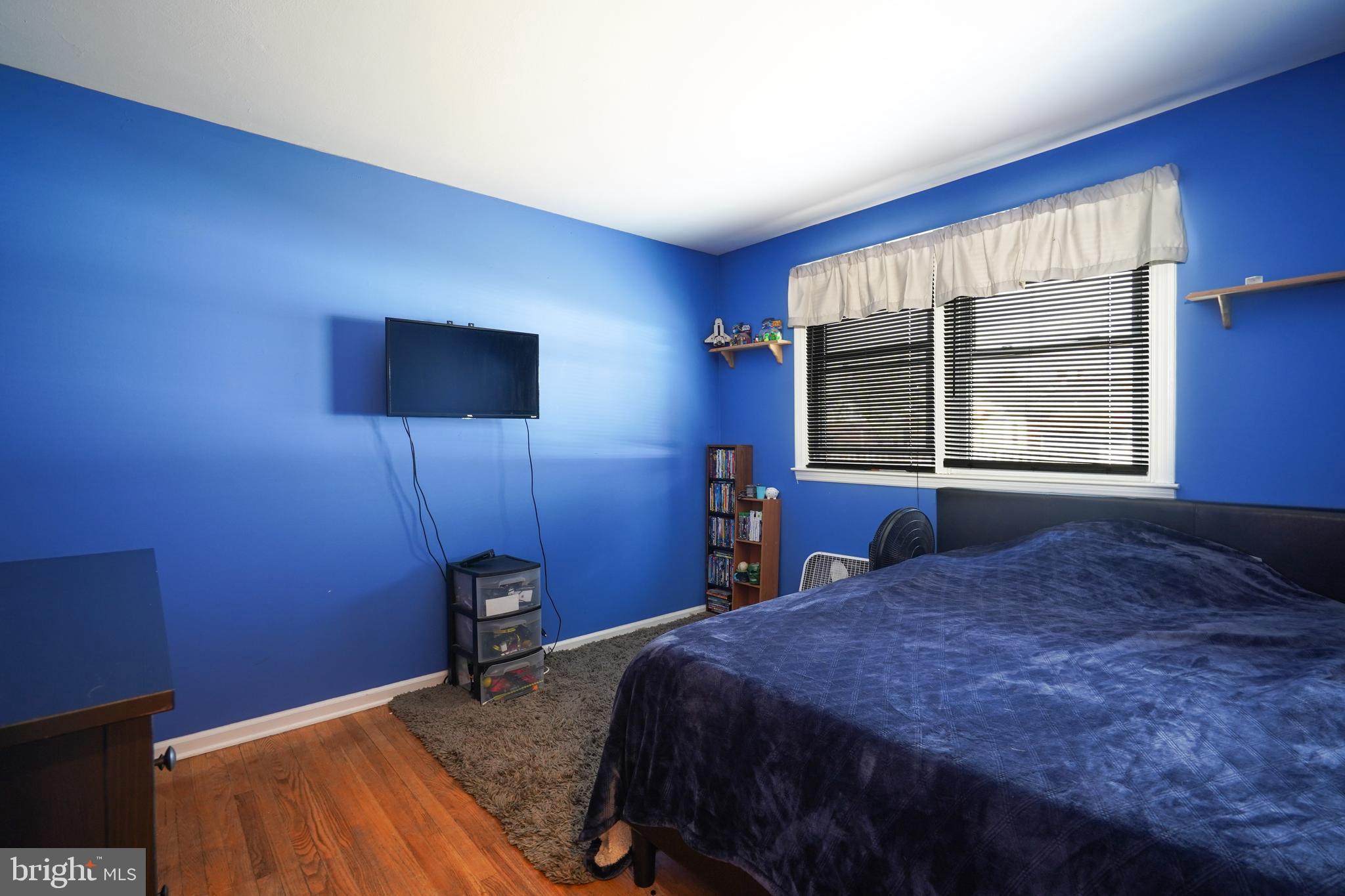 1136 Musket Road Newark, DE 19713 - Photo 11 of 16 a bedroom with a bed and a window