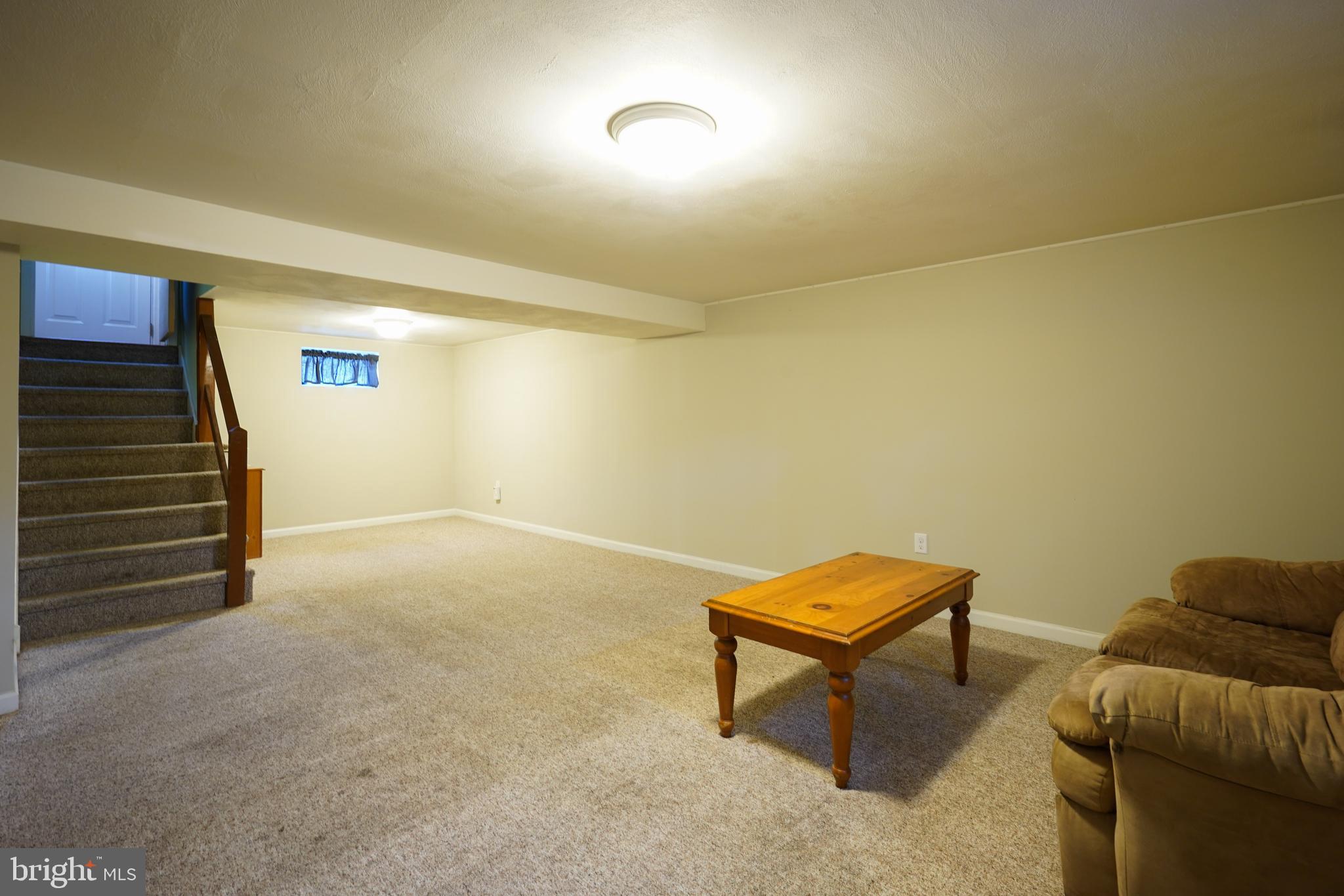 1136 Musket Road Newark, DE 19713 - Photo 14 of 16 a living room with furniture and a piano