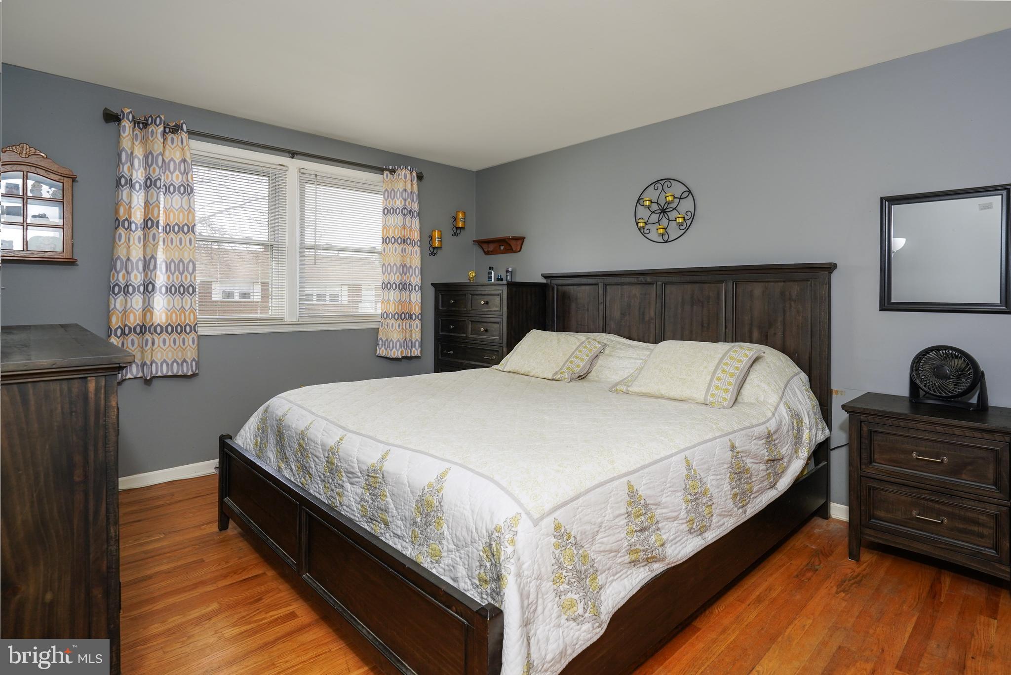 1136 Musket Road Newark, DE 19713 - Photo 10 of 16 a bed sitting in a bedroom next to a window