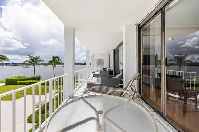 a view of balcony with furniture