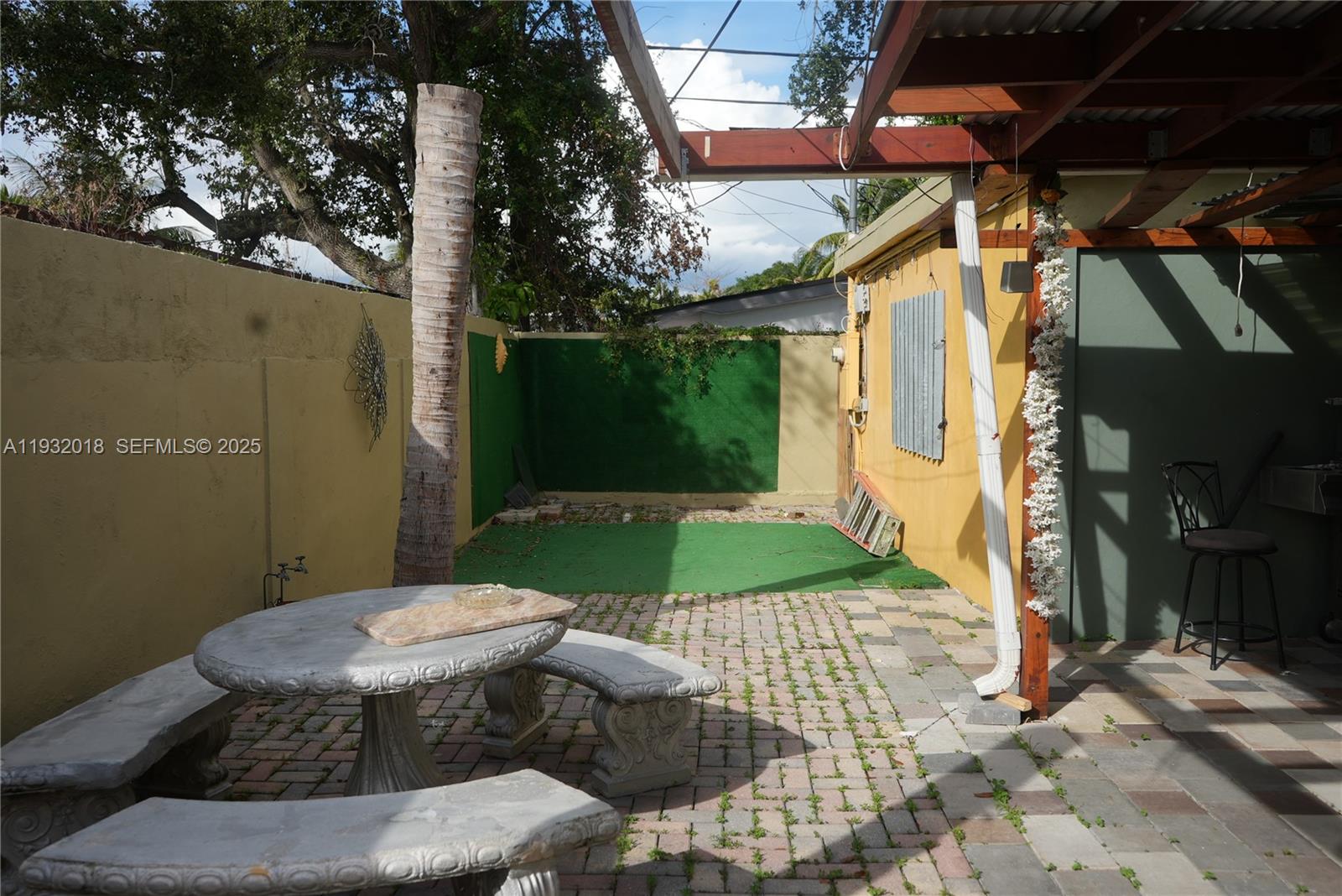 3285 Northwest 97th Street Miami, FL 33147 - Photo 33 of 44 a view of outdoor space and patio