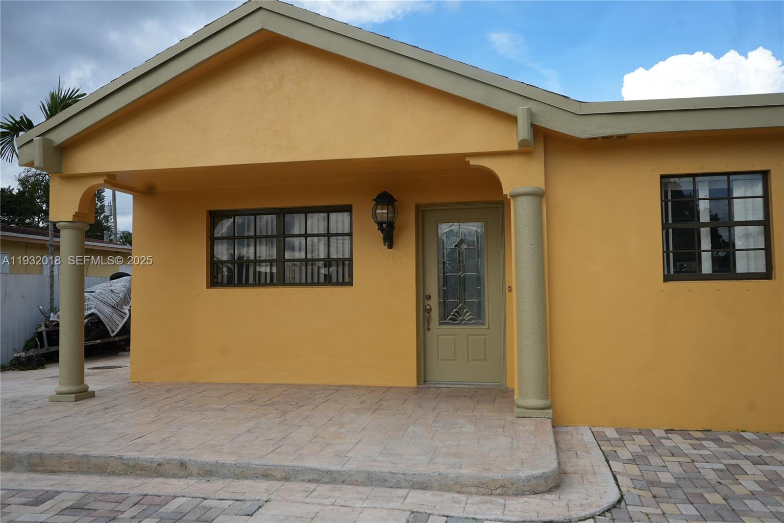 3285 Northwest 97th Street Miami, FL 33147 - Photo 38 of 44 a front view of a house