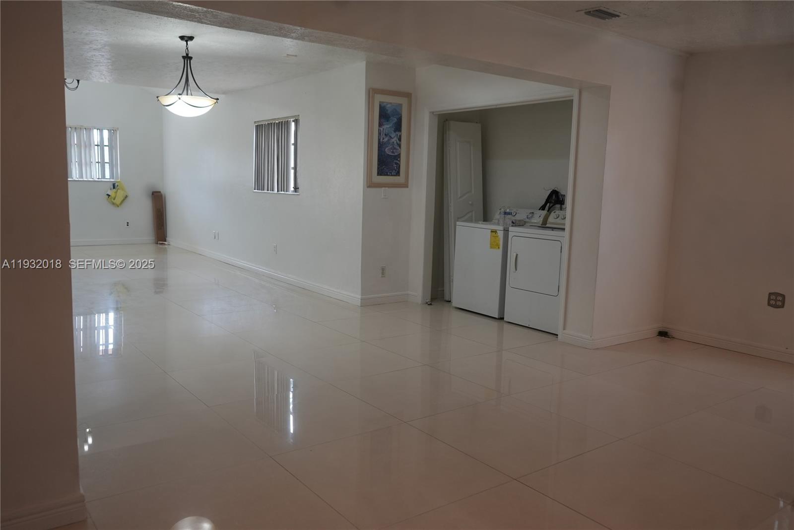 3285 Northwest 97th Street Miami, FL 33147 - Photo 4 of 44 a view of a hallway with closet
