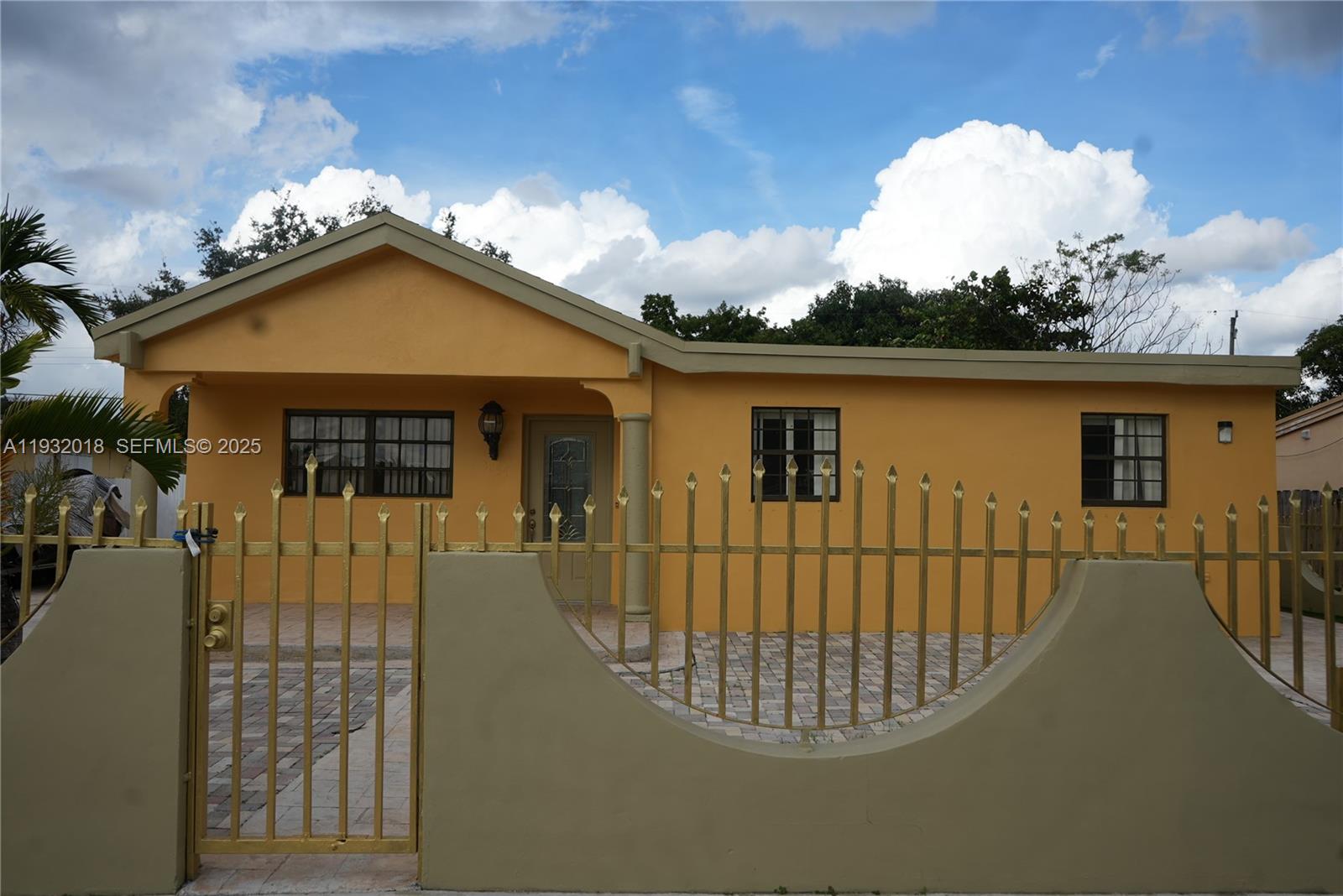 3285 Northwest 97th Street Miami, FL 33147 - Photo 42 of 44 a view of a house with a balcony