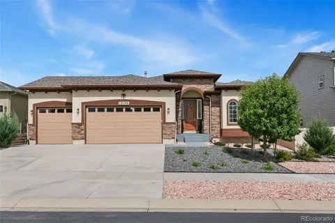 front view of a house with a garage