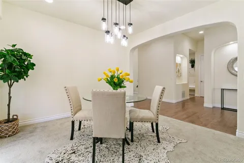 a spacious bedroom with a bed and a couch