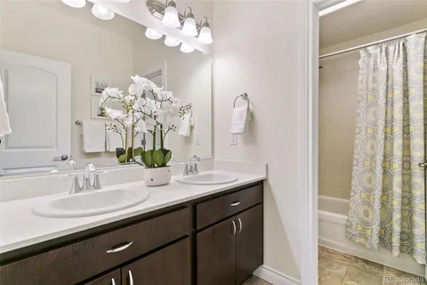 an empty room with furniture and a chair