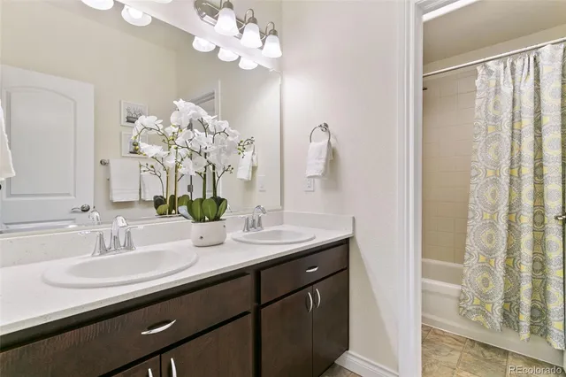 an empty room with furniture and a chair