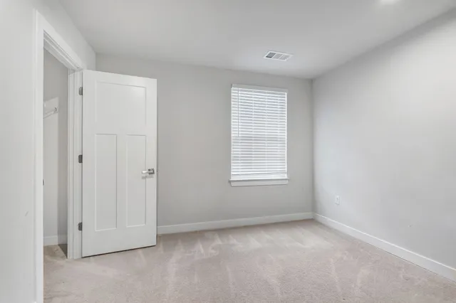 a bathroom with a sink toilet and vanity