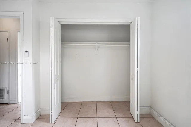 a view of an empty walk in closet