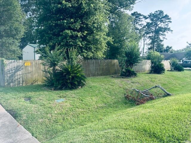 802 Fall Creek Drive Huffman, TX 77336 - Photo 2 of 17 a view of a backyard