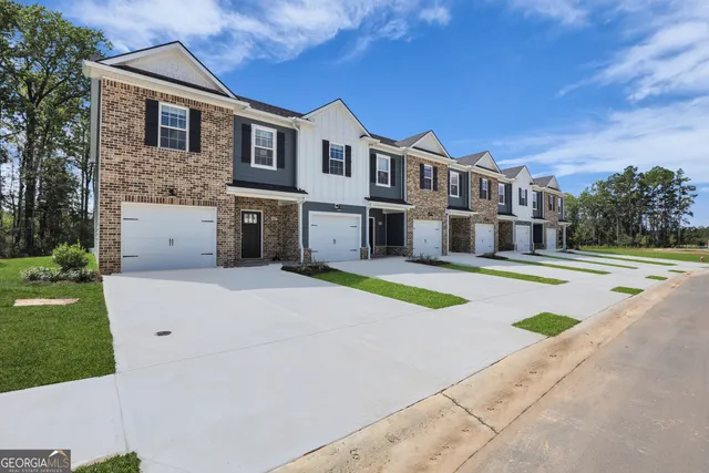 a house that has a lot of plants in it