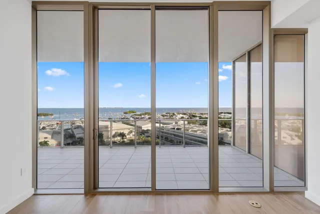 a view of a hallway with a white door