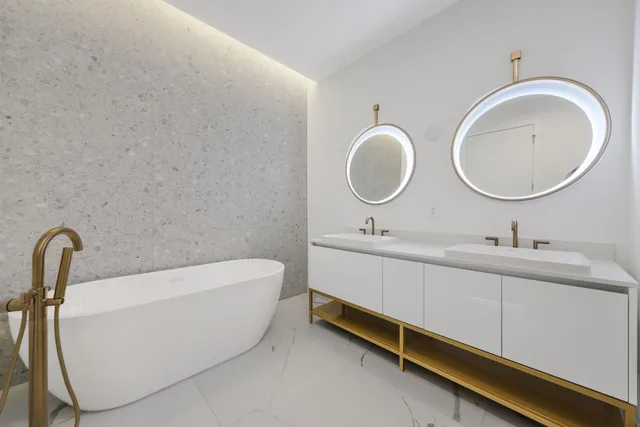 a view of a workspace with furniture and a potted plant