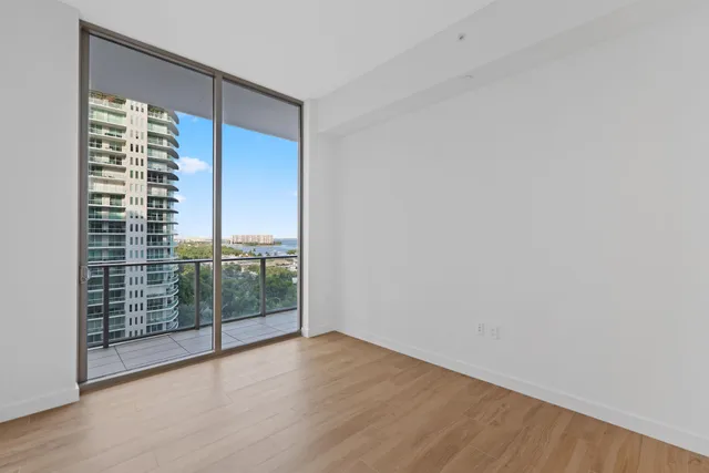 a room with furniture and wooden floor