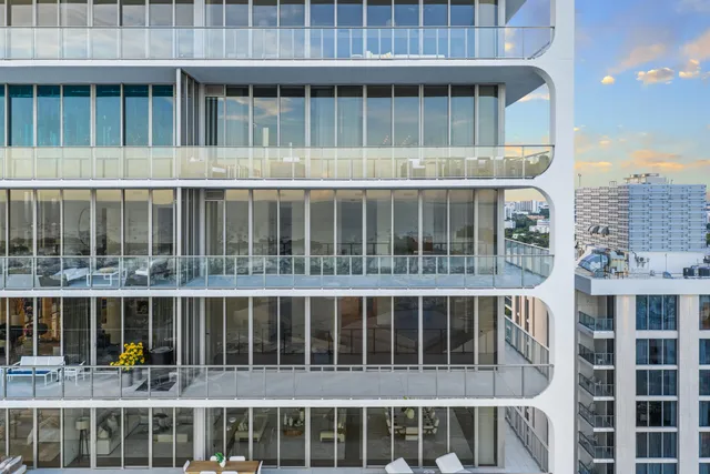 a view of hallway with wooden floor