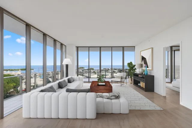 a view of an empty room with glass windows