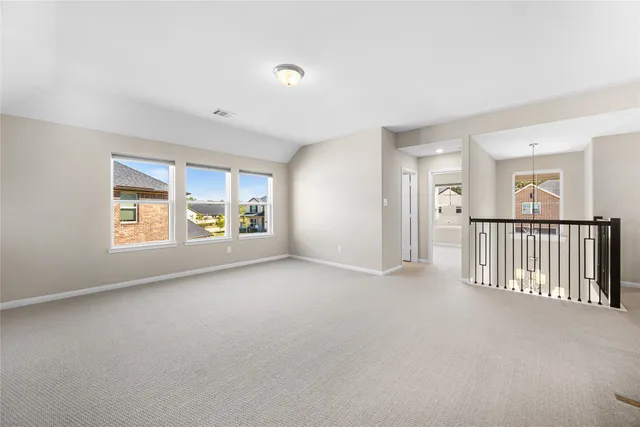 en view interior of a house with wooden floor and windows