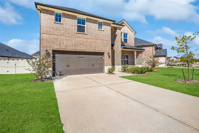 a front view of house with yard