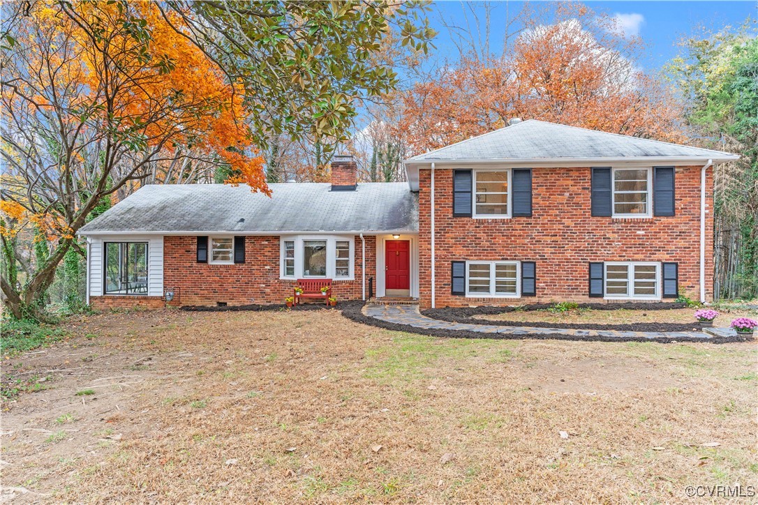 10012 Oldfield Drive Richmond, VA 23235 - Photo 1 of 1 front view of a house with a yard