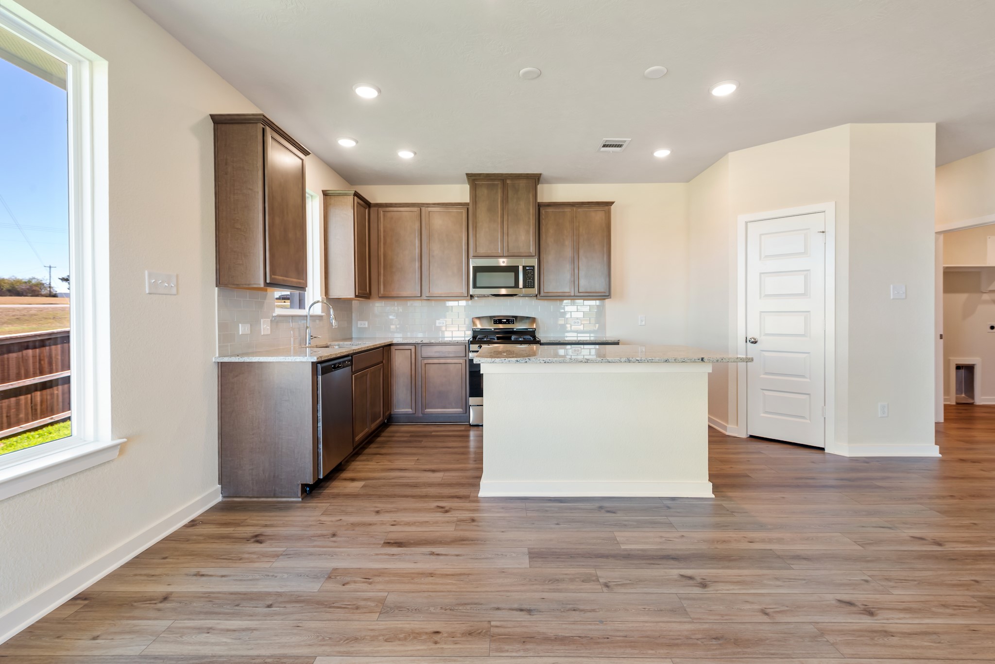 1456 Lk Rdg Drive Brenham, TX 77833 - Photo 16 of 34 a view of kitchen with wooden floor
