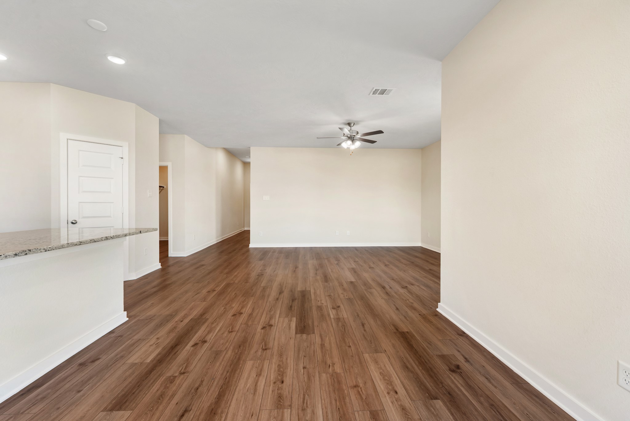 1456 Lk Rdg Drive Brenham, TX 77833 - Photo 21 of 34 a view of a room with wooden floor