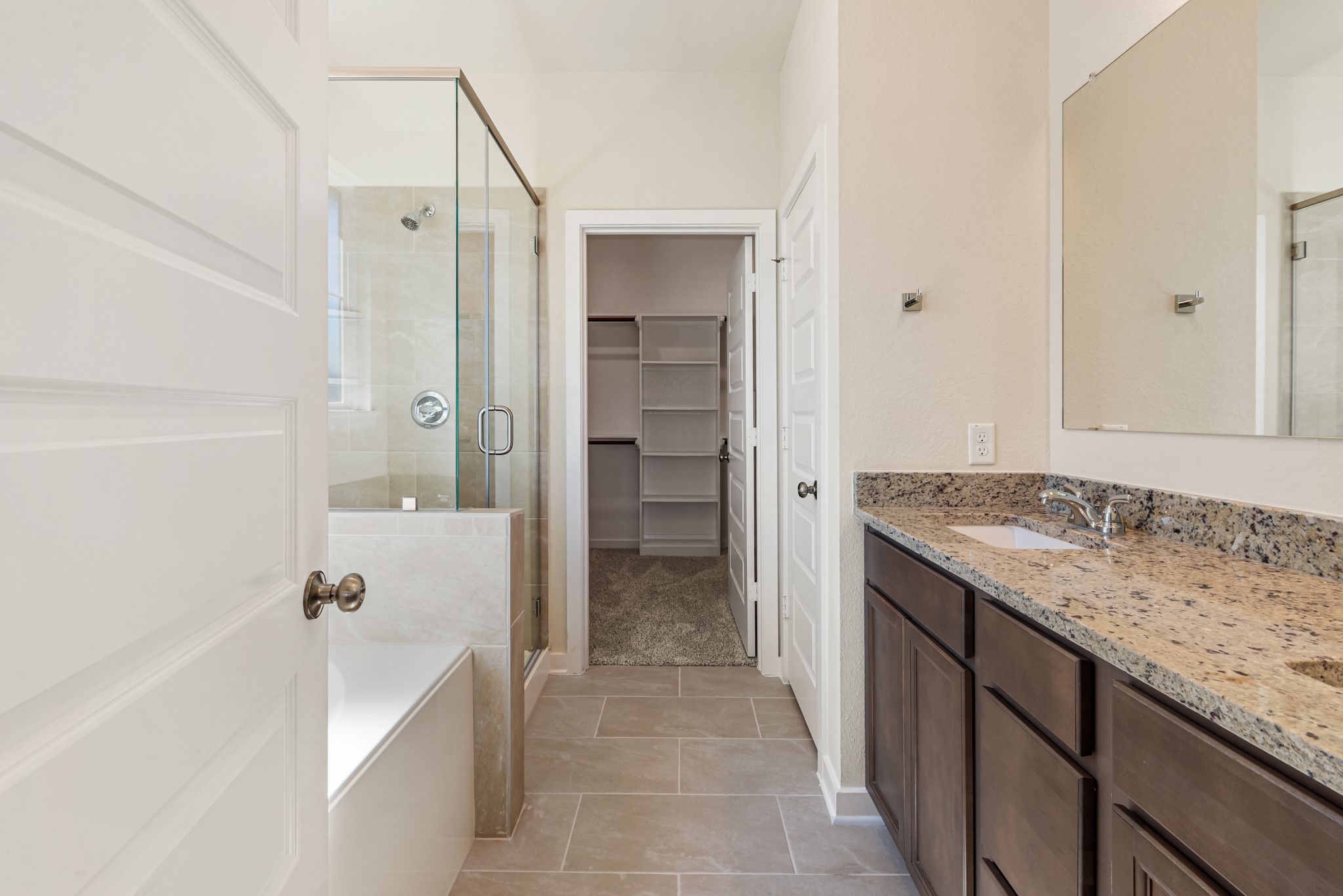 1456 Lk Rdg Drive Brenham, TX 77833 - Photo 29 of 34 a bathroom with a tub shower and sink