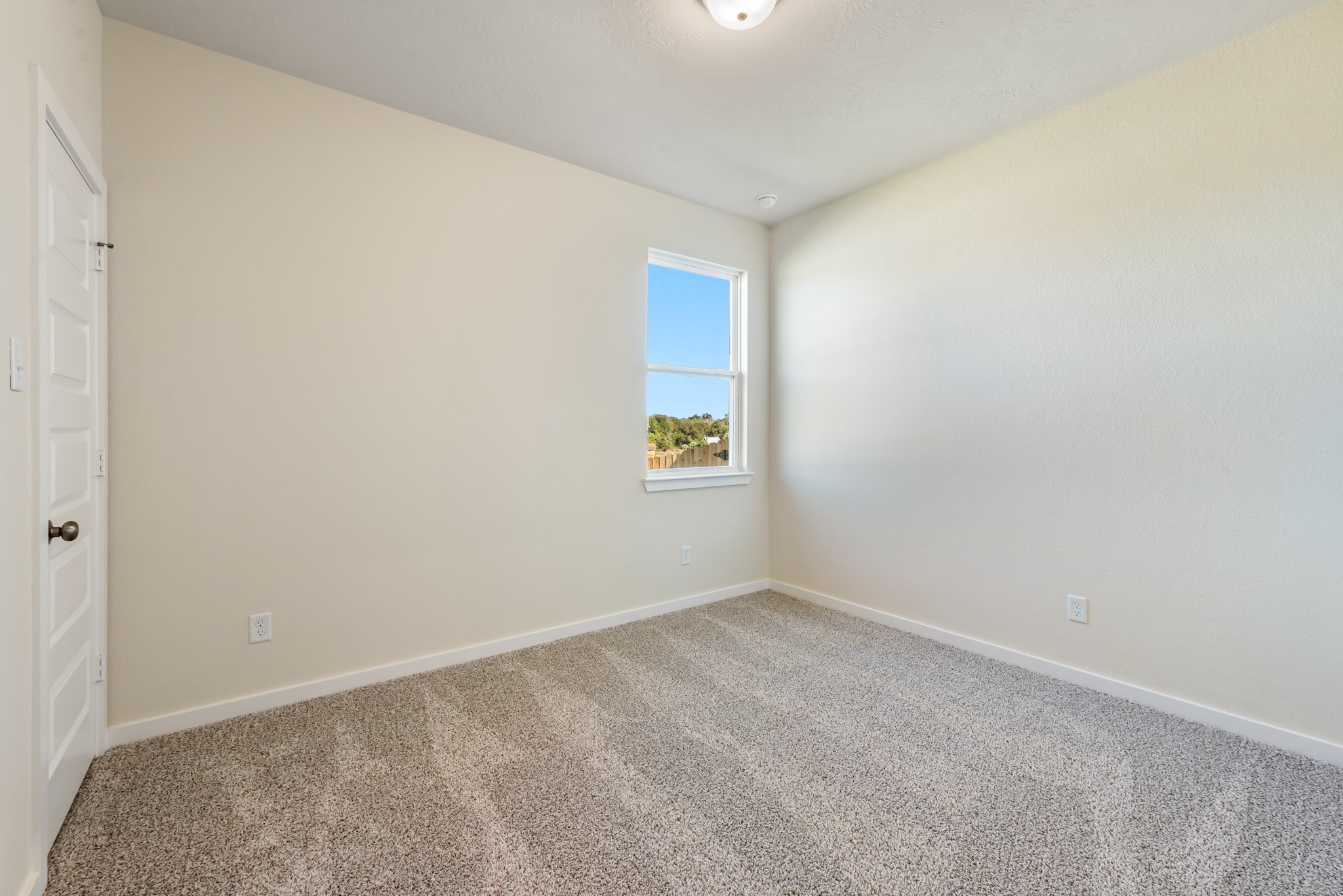 1456 Lk Rdg Drive Brenham, TX 77833 - Photo 7 of 34 a view of an empty room with a window