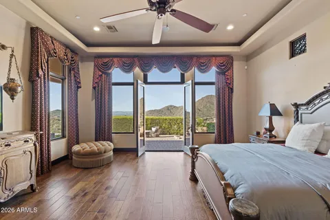 a very nice looking room with a large window and a rug
