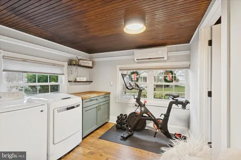a view of a storage & utility room with washer and dryer