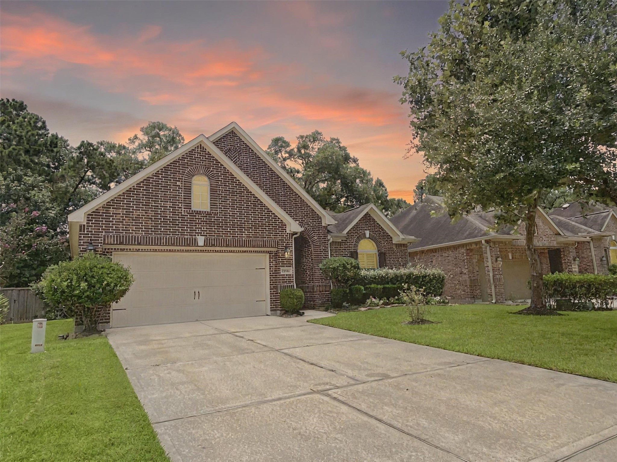 19861 Driver Forest Drive Porter, TX 77365 - Photo 1 of 38 a front view of a house with a yard and garage