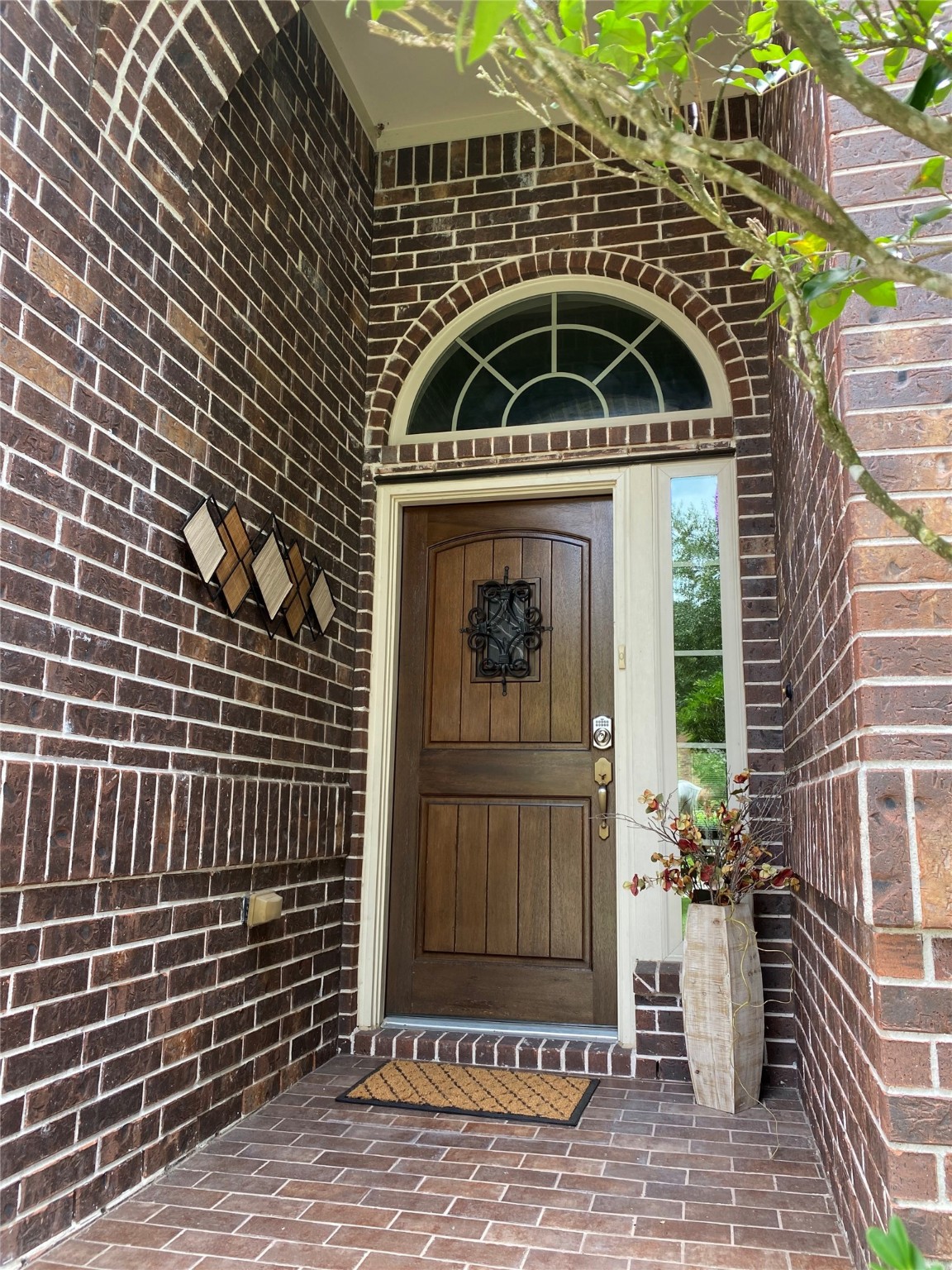 19861 Driver Forest Drive Porter, TX 77365 - Photo 5 of 38 a view of a brick house with a window