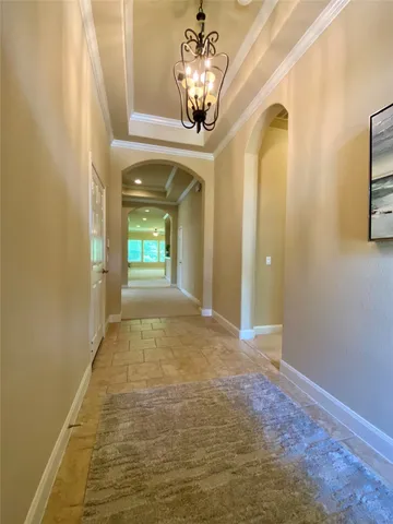 a view of a room with a potted plant