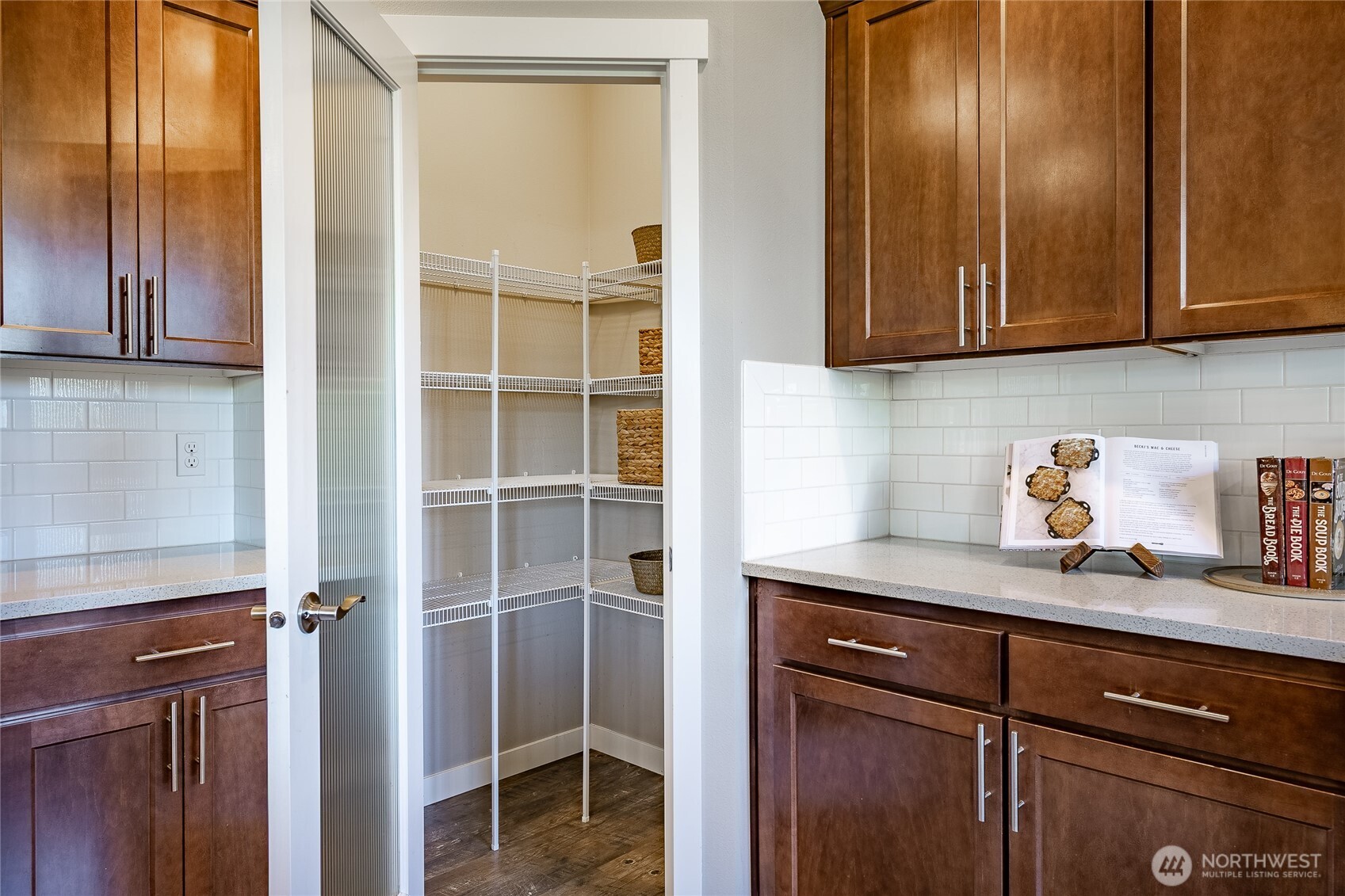 5319 Coastal Loop Blaine, WA 98230 - Photo 12 of 40 a kitchen with granite countertop cabinets and wooden floor
