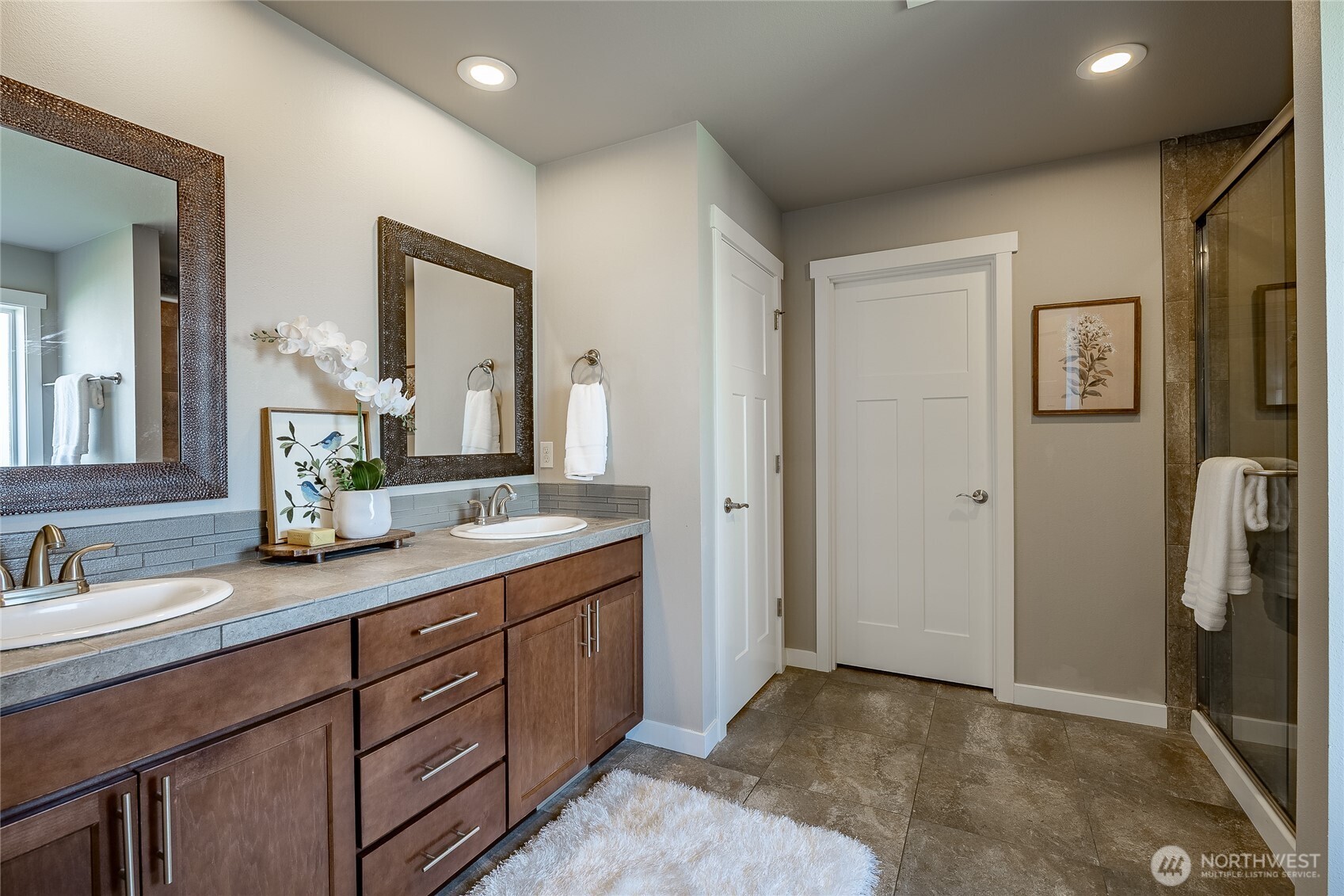 5319 Coastal Loop Blaine, WA 98230 - Photo 24 of 40 a spacious bathroom with a double vanity sink and a mirror